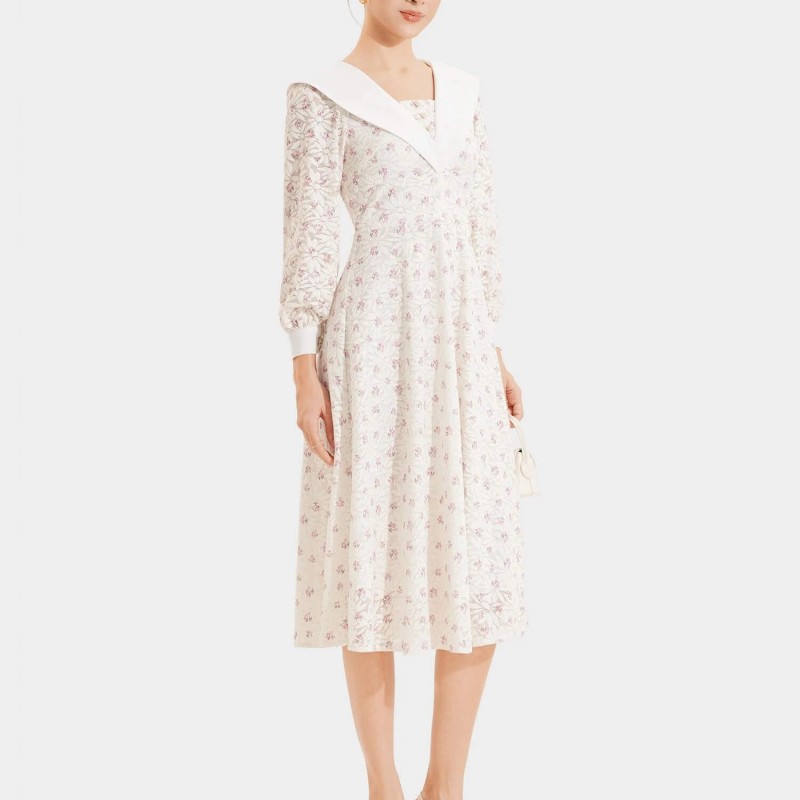 Đầm ren midi in hoa tay dài phối lá cổ